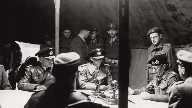 Wilmot, far left, witnesses Field Marshal Montgomery, right, reading the terms of Germany’s surrender. Picture: Mondadori Portfolio via Getty Images