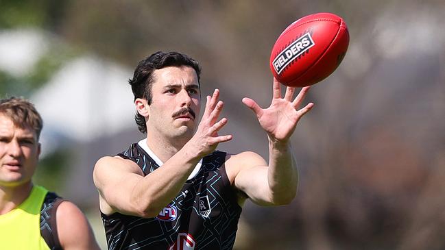 ADELAIDE, AUSTRALIA - SEPTEMBER 12: Josh Sinn during a Port Adelaide Power captain's run at Alberton Oval on September 12, 2024 in Adelaide, Australia. (Photo by Sarah Reed/Getty Images)