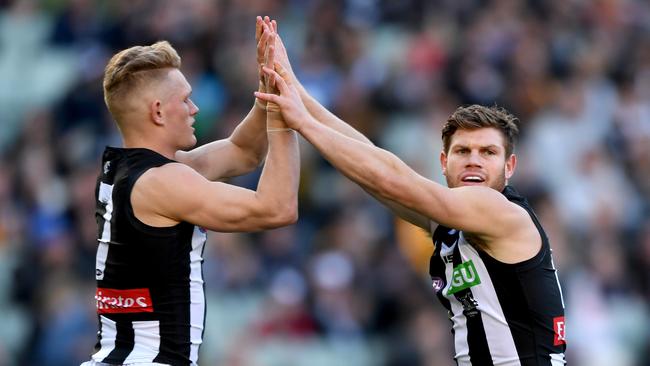Adam Treloar and Taylor Adams playing together in 2017. Picture: AAP Image/Joe Castro