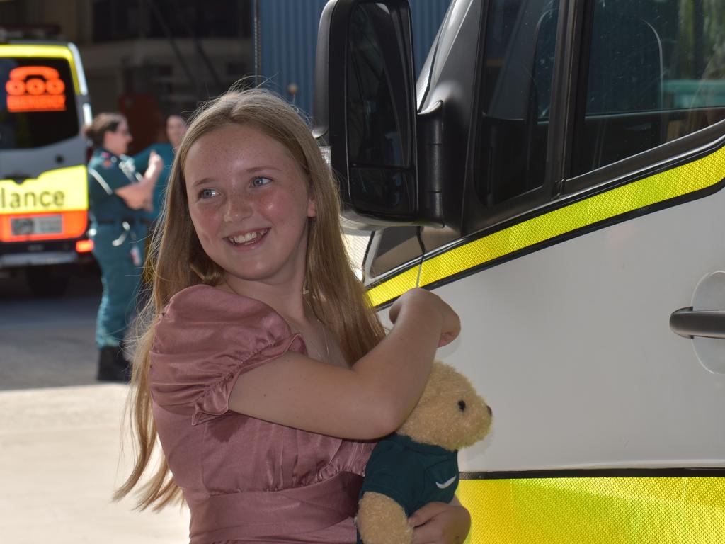 Madison Jennings accepted her certificate of appreciation at Mackay South Ambulance station after rescuing her cousin from drowning. Picture: Lillian Watkins