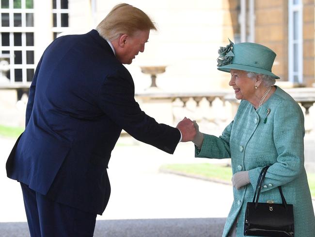 US President Donald Trump is greeted by the Queen at Buckingham Palace. Picture: Getty