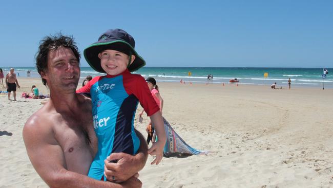 Roger and Jayce Ellsworth of Beerwah having fun at Coolum Beach in 2013.