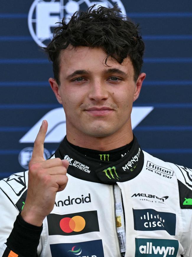 Norris had plenty to celebrate in Monaco. (Photo by Andrej ISAKOVIC / AFP)