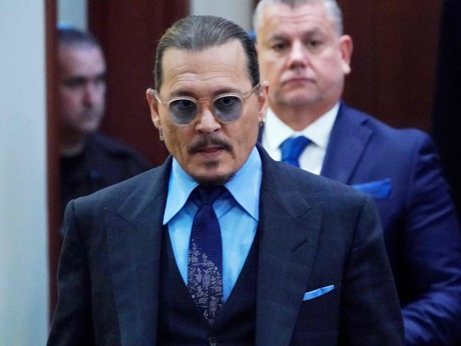 US actor Johnny Depp walks into the courtroom after a break at the Fairfax County Circuit Court in Fairfax, Virginia. Picture: AFP