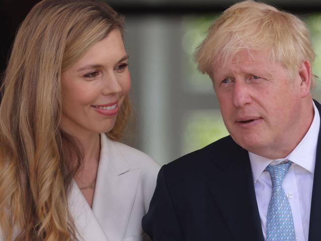 GARMISCH-PARTENKIRCHEN, GERMANY - JUNE 26: (EDITORS NOTE: Retransmission with alternate crop.) British Prime Minister Boris Johnson and wife Carrie Johnson walk to the first working session on the first day of the three-day G7 summit at Schloss Elmau on June 26, 2022 near Garmisch-Partenkirchen, Germany. Leaders of the G7 group of nations are officially coming together under the motto: "progress towards an equitable world" and will discuss global issues including war, climate change, hunger, poverty and health. Overshadowing this year's summit is the ongoing Russian war in Ukraine. (Photo by Sean Gallup - Pool/Getty Images)