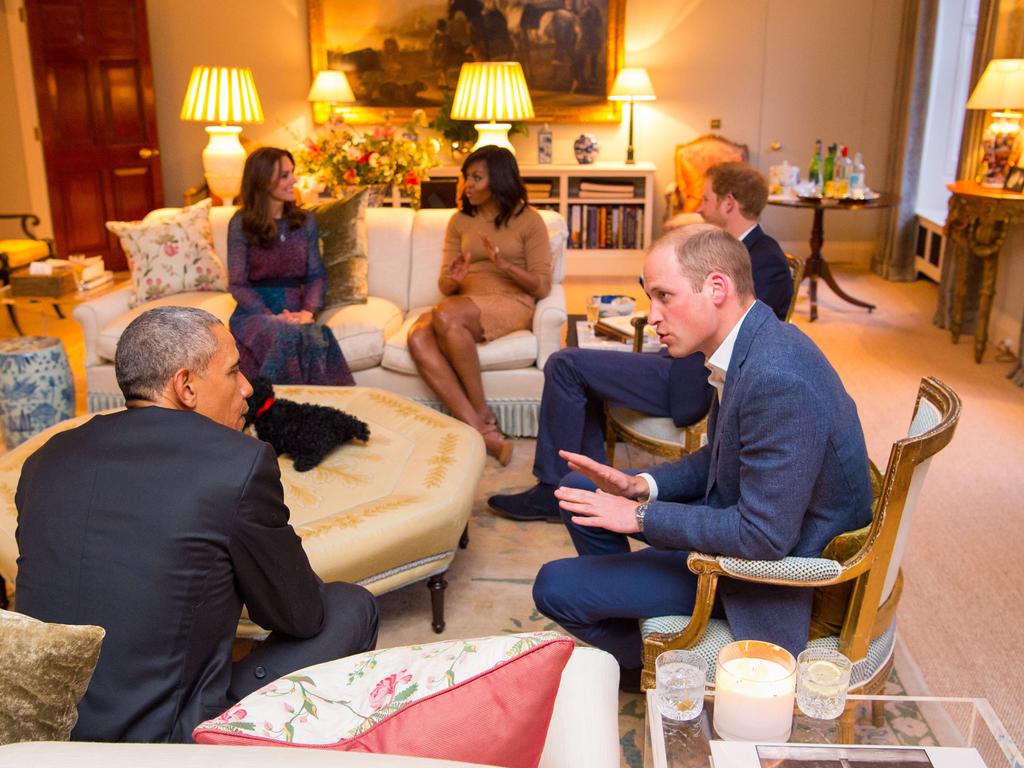 Barack and Michelle Obama meeting with Prince William, Catherine and Prince Harry in the Drawing Room of Apartment 1A Kensington Palace in 2016 in London, England. Picture: Getty Images