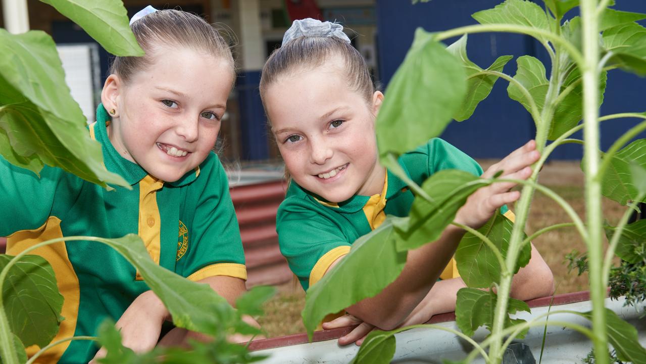 Proserpine Primary green thumbs Kaitlyn and Amber Crisp, Year 5, are set to benefit from Life Education Queensland's Healthy Eats program. Picture: Jim Cullen