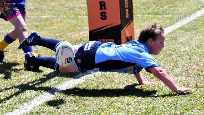 An under 8’s rugby league player drops the ball over the line as he attempts to score a try. Picture: Cameron Bates