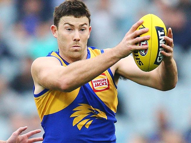 MELBOURNE, AUSTRALIA - APRIL 21:  Jeremy McGovern of the Eagles runs with the ball from Charlie Curnow of the Blues  during the round five AFL match between the Carlton Blues and the West Coast Eagles at Melbourne Cricket Ground on April 21, 2018 in Melbourne, Australia.  (Photo by Michael Dodge/Getty Images)