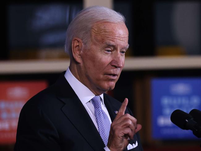 SCRANTON, PENNSYLVANIA - OCTOBER 20: President Joe Biden speaks at an event at the Electric City Trolley Museum in Scranton on October 20, 2021 in Scranton, Pennsylvania. In an effort to appease West Virginia Senator Joe Manchin, the President has discussed a $1.75 to $1.9 trillion price tag for the spending package that's currently being negotiated.   Spencer Platt/Getty Images/AFP == FOR NEWSPAPERS, INTERNET, TELCOS & TELEVISION USE ONLY ==