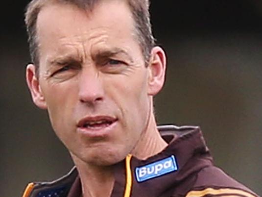 MELBOURNE, AUSTRALIA - SEPTEMBER 25: Coach Alastair Clarkson talks to Jarryd Roughead during a Hawthorn Hawks AFL training session at Waverley Park on September 25, 2014 in Melbourne, Australia. (Photo by Michael Dodge/Getty Images)