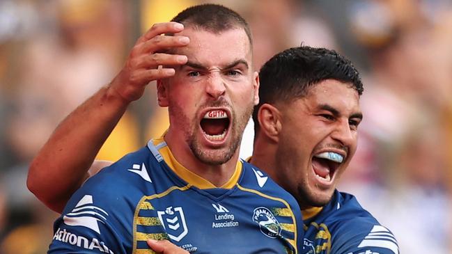 Clint Gutherson and Dylan Brown celebrate after a try. Picture: Cameron Spencer/Getty Images