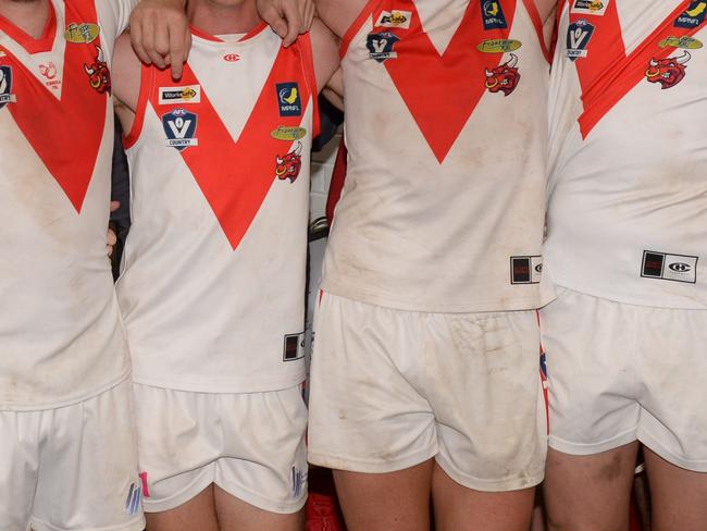 MPNFL Division 2 preliminary final: Langwarrin v Karingal at Somerville. Karringal Bulls players celebrate the big win.  Picture: AAP/ Chris Eastman