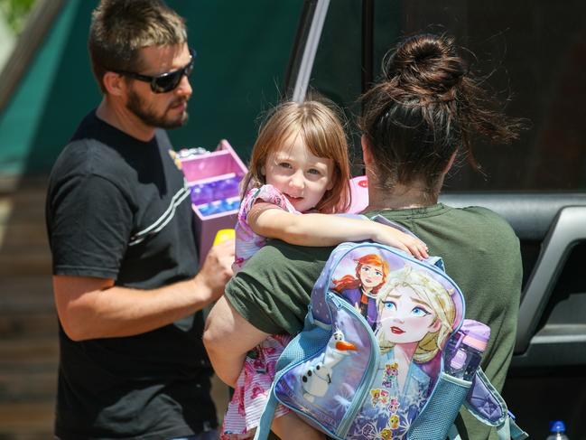 Cleo Smith back in the arms of her mother and stepfather. Picture: Getty Images