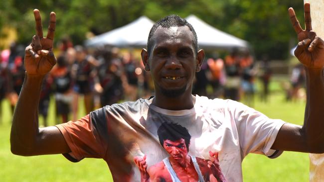 A Tiwi local posing for a picture before the lightning storm hit the ground. Picture: Darcy Jennings