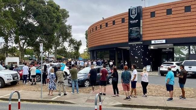 The line up outside the Port Store at Alberton this morning before the Prison Bar guernseys went on sale. Picture Facebook