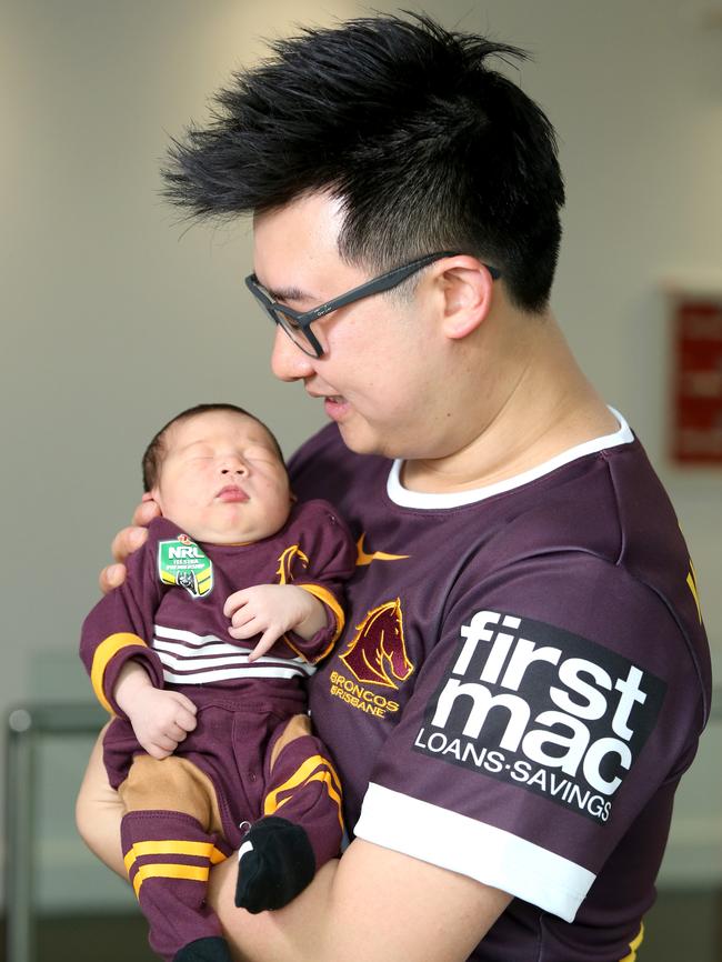 NRL SuperCoach winner Wilfred Zee with son Noah. Picture: Jono Searle