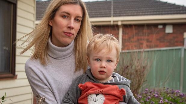 Domenique Szantyr, 35, and son Lachlan, 2, are trying to get to South Australia to her terminally ill mother. Picture: Jason Edwards