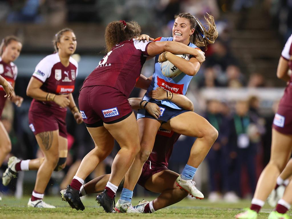 Isabelle Kelly of the Blues is tackled/ Picture: Mark Nolan/Getty Images