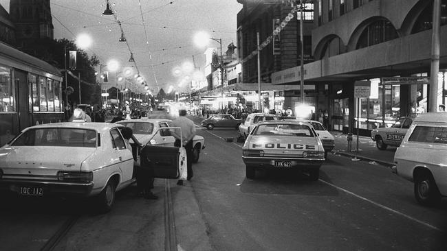 March 1978: The scene outside the Manchester Unity Building after a robbery and triple murder. Picture: Herald Sun