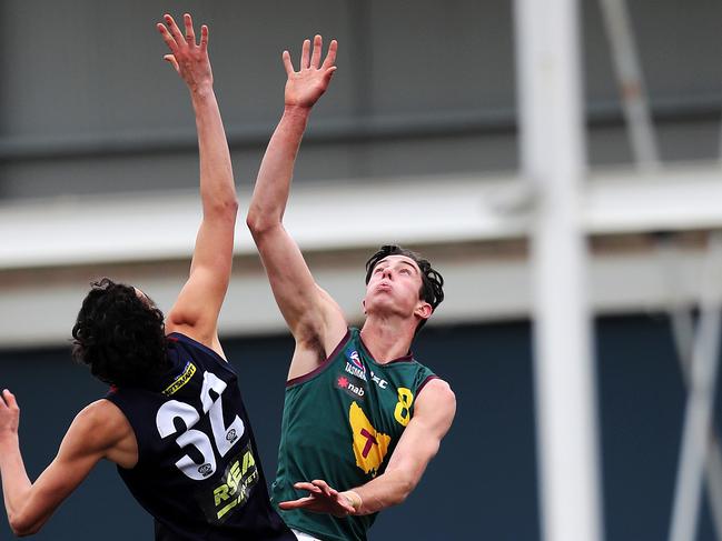 Saindringham Dragons Jack Bell and Tasmanian Devils Jake Steele at Invermay Park. PICTURE CHRIS KIDD