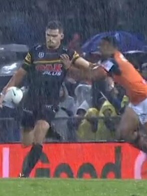 David Nofoaluma tries to knock Nathan Cleary off balance.