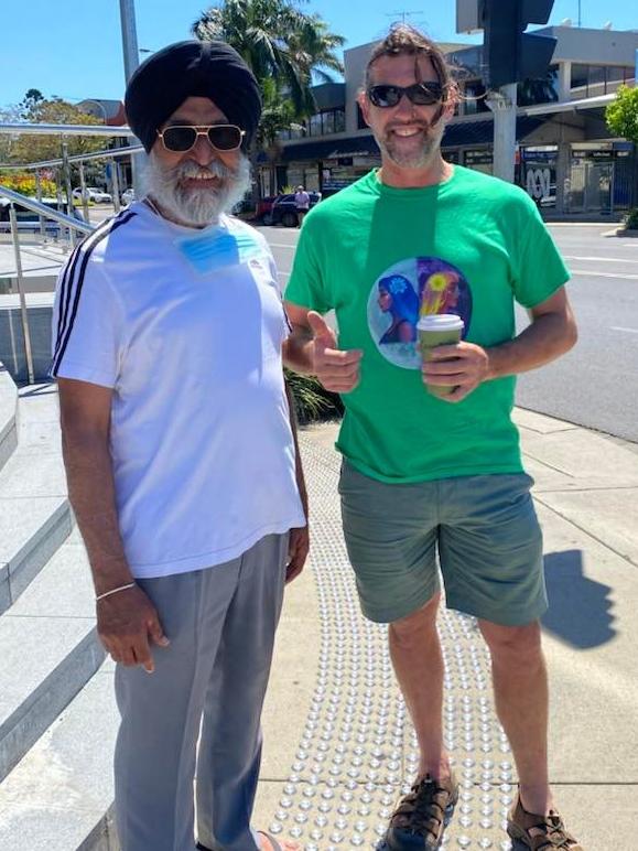 Andrew Coombes (right) from Bellingen with Dr Parmjit Singh on the way to vote at Coffs Harbour.