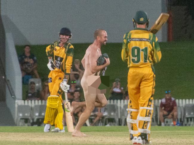 The streaker dashes across the pitch to the amusement of Pioneer Valley’s batters. Picture:Michaela Harlow