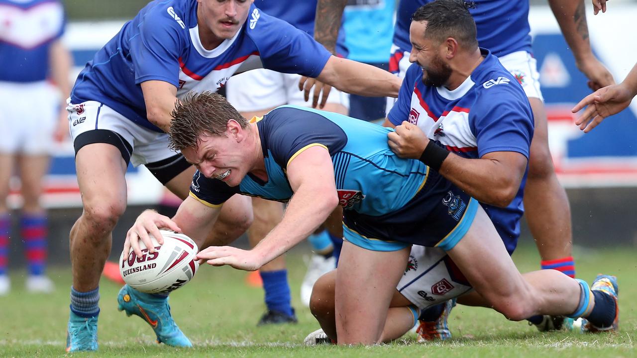 Zane Harris dives over for the Gold Coast Vikings against Brisbane Blue. Picture: Richard Gosling