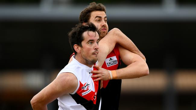 Charlie Rossetti (right) battles Mitchell Garner. Picture: Josh Chadwick