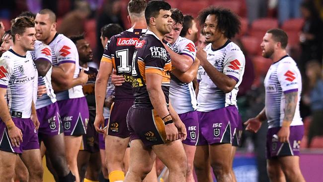 David Fifita of the Broncos (centre) reacts after losing