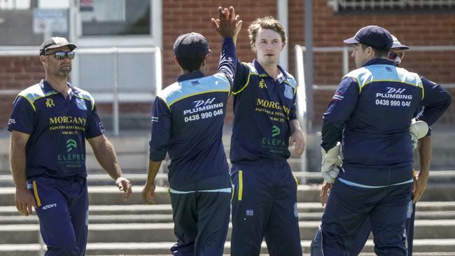 MPCA: Joshua Mack celebrates a wicket for Baxter. Picture: Valeriu Campan