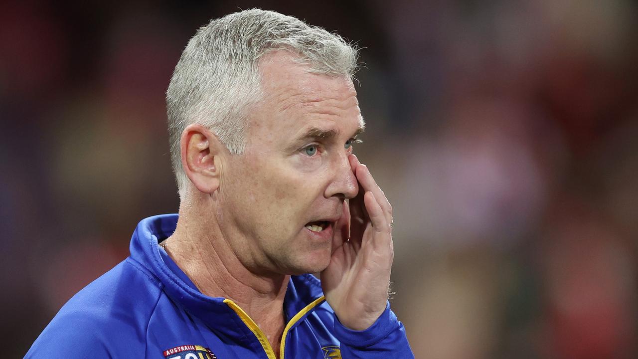 SYDNEY, AUSTRALIA - JUNE 24: Eagles head coach Adam Simpson talks to players at quarter time during the round 15 AFL match between Sydney Swans and West Coast Eagles at Sydney Cricket Ground, on June 24, 2023, in Sydney, Australia. (Photo by Mark Metcalfe/AFL Photos/via Getty Images )