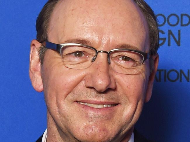 Actor Kevin Spacey poses with the award for Best Actor - TV Sereis, Drama for his role in "House of Cards," in the press room at the 72nd annual Golden Globe Awards, January 11, 2015 at the Beverly Hilton Hotel in Beverly Hills, California. AFP PHOTO / FREDERIC J BROWN