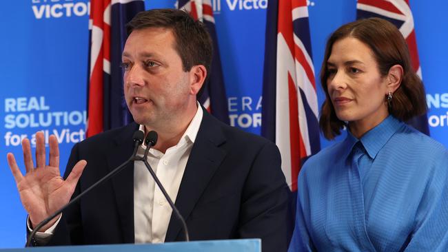 Victorian Liberal leader Matthew Guy, with wife Renae, speaks to supporters after his defeat to Daniel Andrews. Picture: David Caird