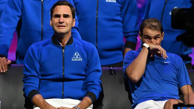 Roger Federer (left) after playing his final game in September 2022, a doubles match with Rafael Nadal (right) of Team Europe. Picture: Glyn Kirk / AFP