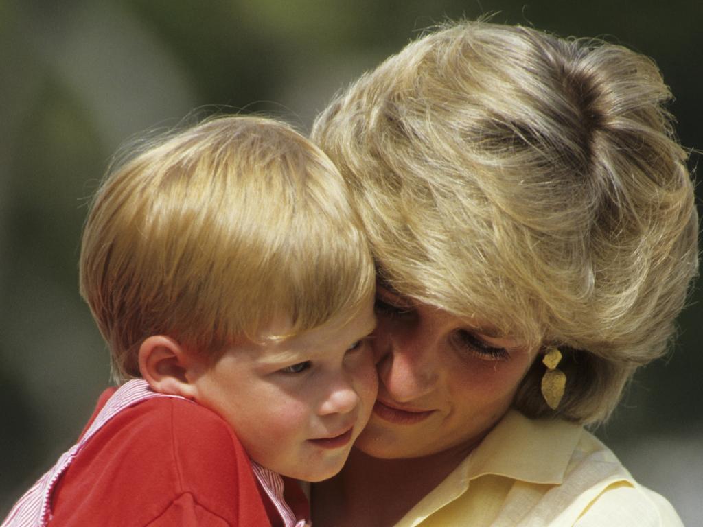 Prince Harry with his late mother Princess Diana on holiday in Majorca, Spain in 1987. Picture: Getty Images