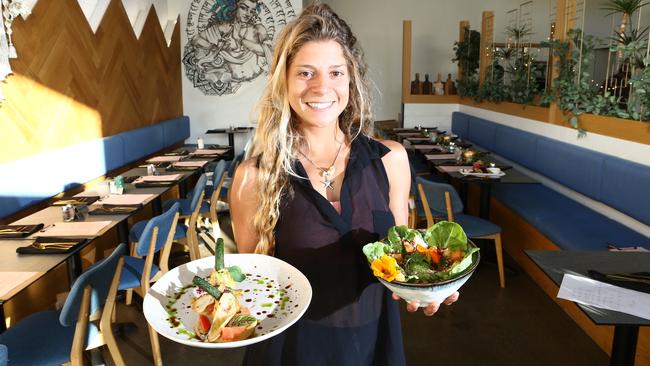 Staff member Debora Franco with some of the lovely food. Picture Glenn Hampson