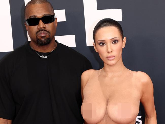 PIXELATED VERSIONS -  LOS ANGELES, CALIFORNIA - FEBRUARY 02: (EDITOR'S NOTE: Image contains nudity.) L-R, Kanye West and Bianca Censori attend the 67th Annual GRAMMY Awards on February 02, 2025 in Los Angeles, California.  (Photo by Matt Winkelmeyer/Getty Images for The Recording Academy)