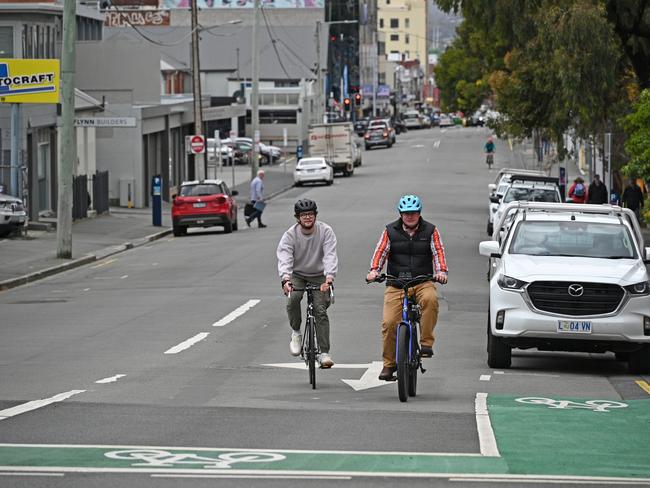 Ben Harrison and Andrew Campbell riding along Collins Street. Picture: Hobart City Council.