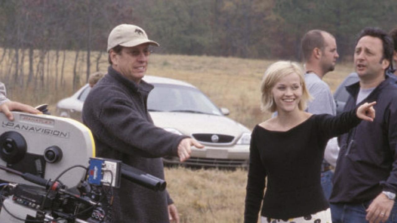 Tennant (L) talking to actress Reese Witherspoon on the set of another of his movie hits, Sweet Home Alabama.