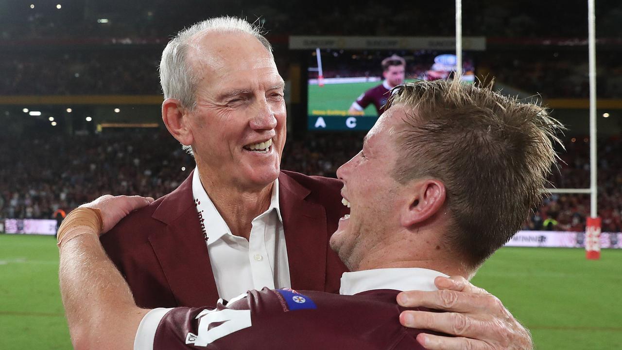 Wayne Bennett with Harry Grant. Queensland vs New South Wales during game 3 of the State of Origin series in Brisbane. Pic Peter Wallis