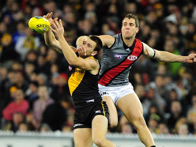 Richmond v Essendon. MCG. Brett O'Hanlon takes a strong mark in front of Kyle Hardingham,