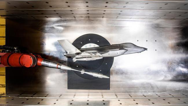 Model of the F-35A mounted on the sidewall of the Defence Science and Technology Group Transonic Wind Tunnel with model of the GBU-31 (V1) weapon during pre-test grid check. Picture: Department of Defence