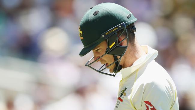 MELBOURNE, AUSTRALIA — DECEMBER 27: Tim Paine of Australia walks off after being dismissed during day two of the Fourth Test Match in the 2017/18 Ashes series between Australia and England at Melbourne Cricket Ground on December 27, 2017 in Melbourne, Australia. (Photo by Michael Dodge/Getty Images)