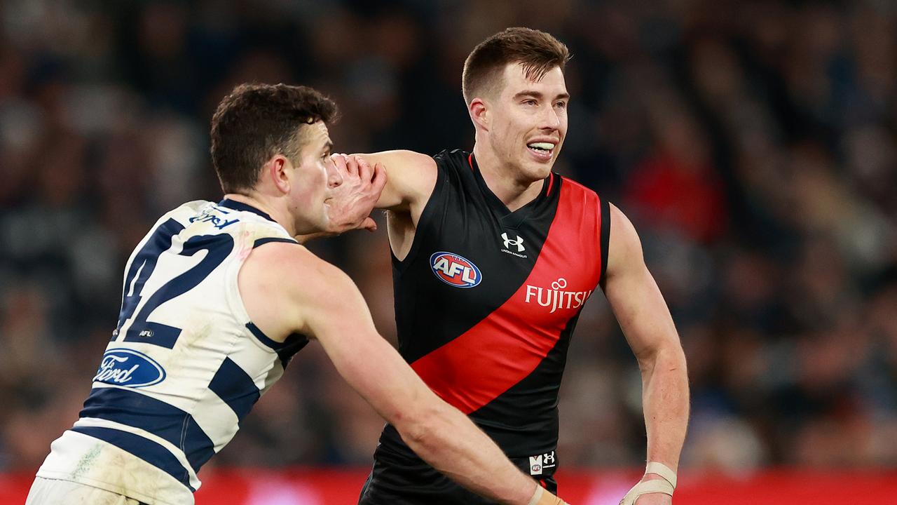 Zach Merrett receives some close attention from Mark O’Connor. Picture: Kelly Defina/Getty Images