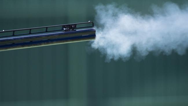 A shot is fired at the Clay Target Shooting Range, Gladstone.Photo Luka Kauzlaric / The Observer