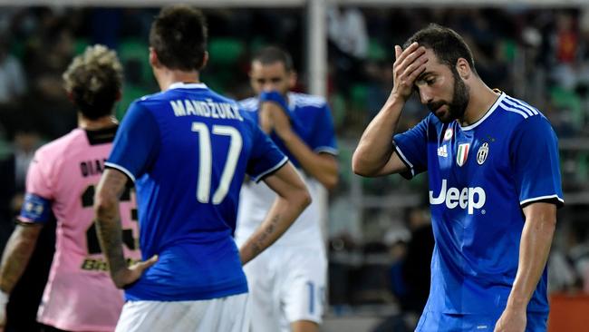 Juventus' Argentinian forward Gonzalo Higuain reacts during the Italian Serie A football match.