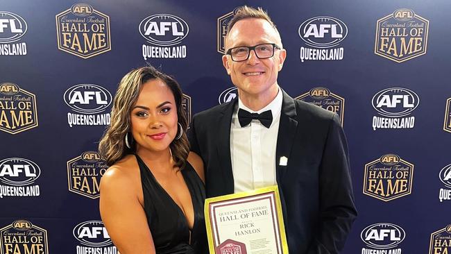 Rick Hanlon and partner Deborah Bond celebrate his induction into the AFL Queensland Hall of Fame earlier this month.