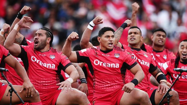 Jason Taumalolo of Tonga performs the Sipi Tau against the Kiwis.